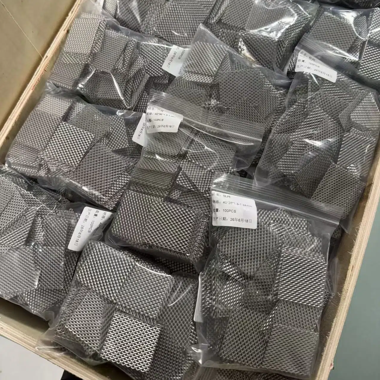 5,000 Custom Titanium Mesh Pieces Shipped for a PEM Electrolyzer Project 1